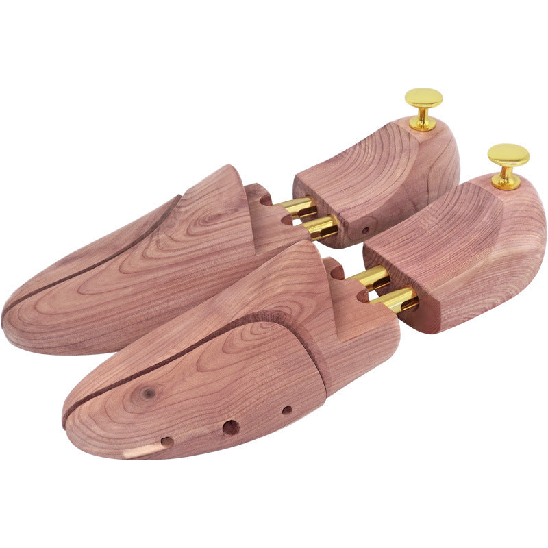 Pair of cedar shoe trees – split toe, spring handle, brass knob