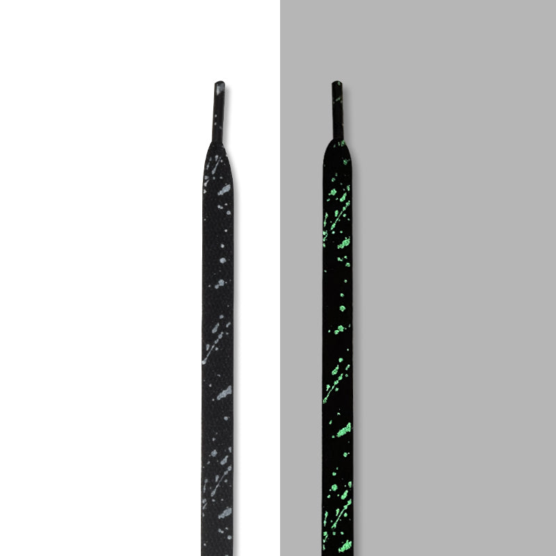 Black glow-in-the-dark splatter laces, in light and glowing