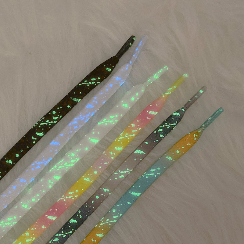 All six glow-in-the-dark splatter lace colorways glowing